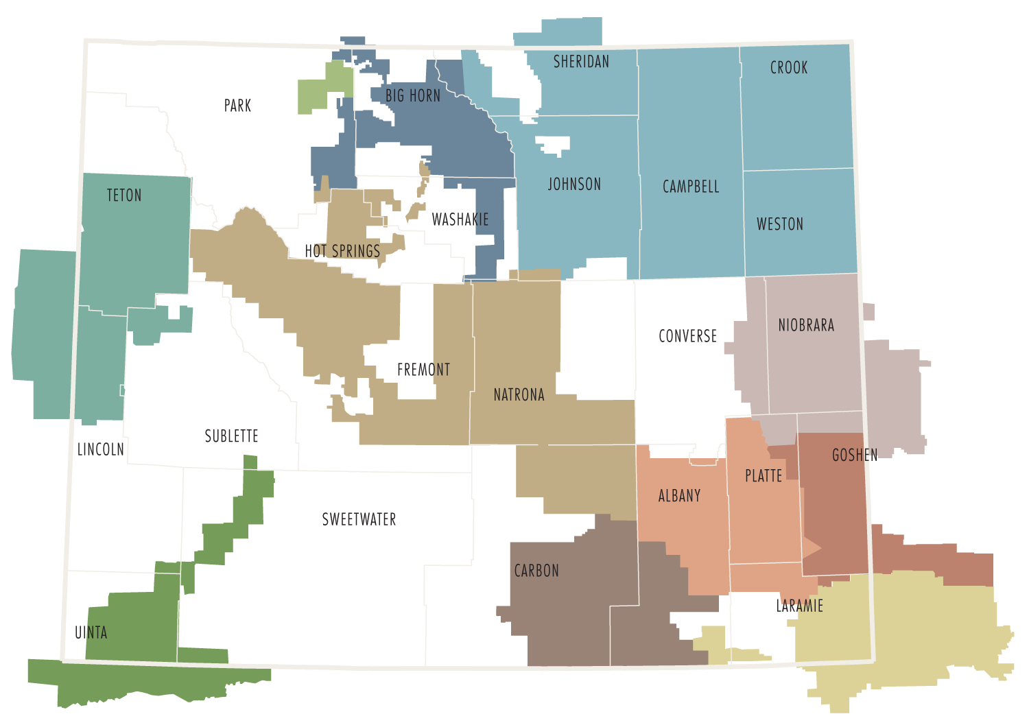A color-coded cooperative map of Wyoming highlighting county boundaries and names, with each co-op territory shaded in a different color.
