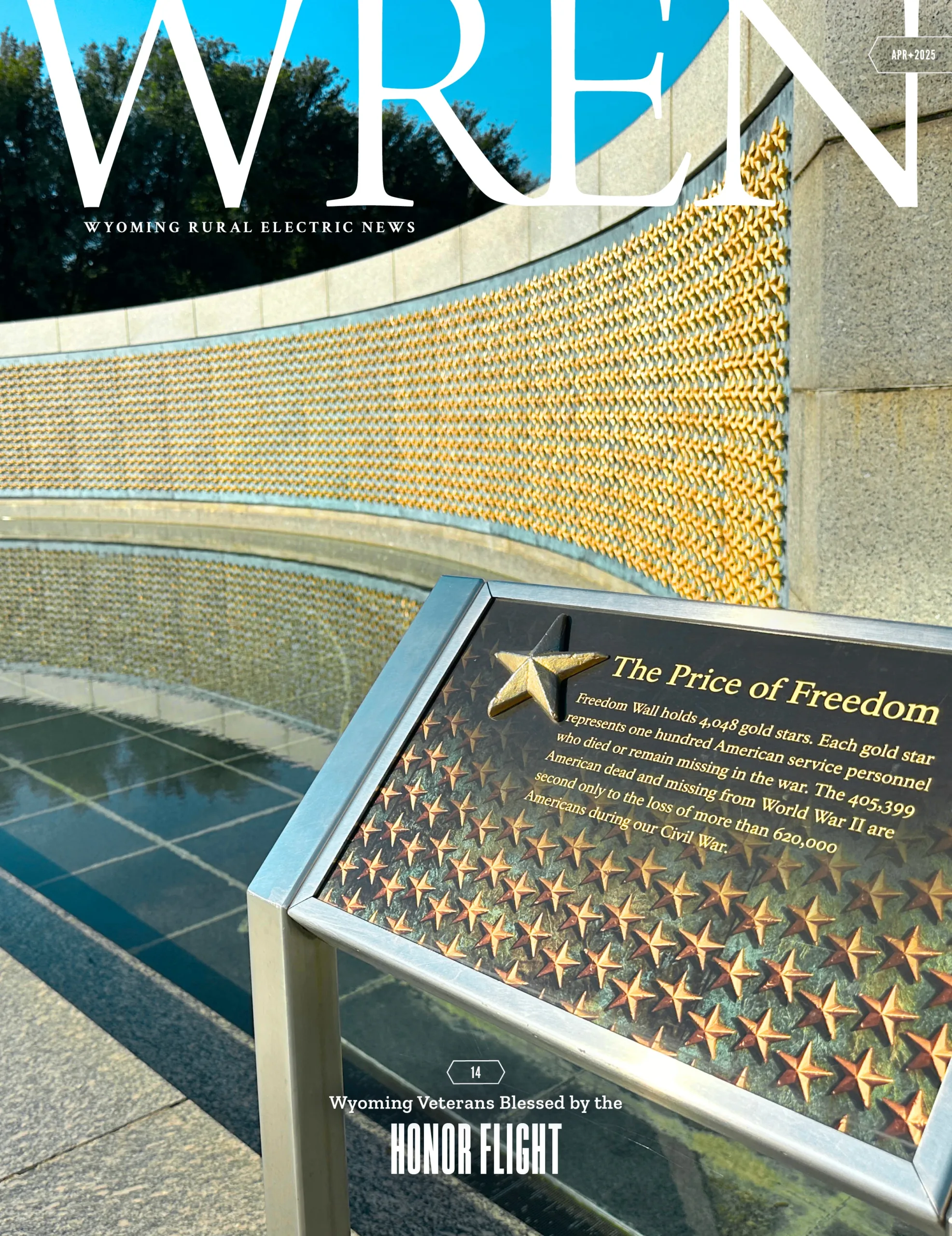 WREN 04-April 2025 Cover A memorial wall with gold stars and a plaque titled The Price of Freedom at the World War II Memorial in Washington, D.C., featured on the cover of Wyoming Rural Electric News.